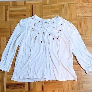 Lucky tee with button fron and floral bib.